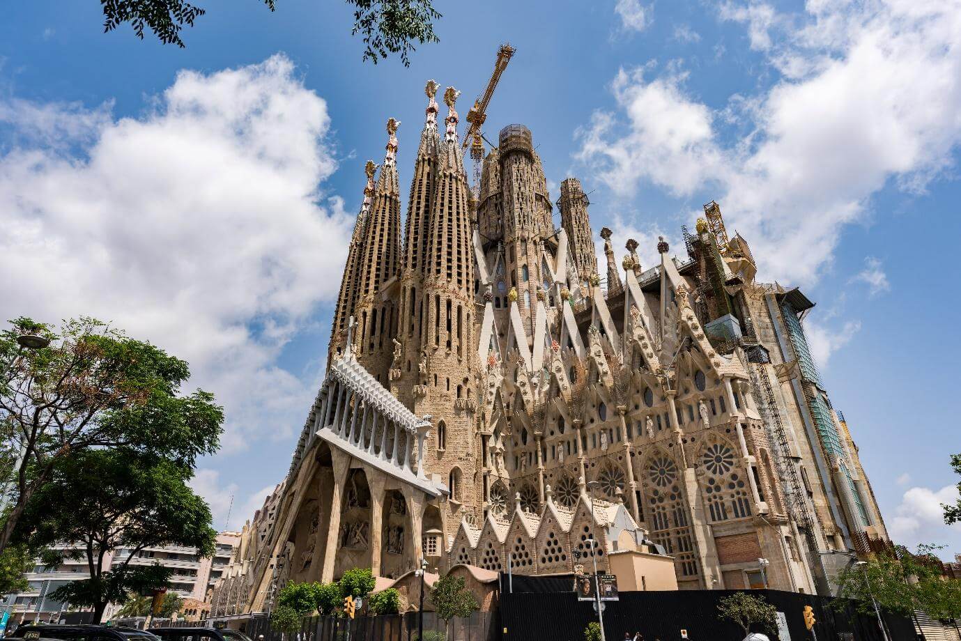 Front view of the Sagrada Família in Barcelona Spain on a sunny bright day.